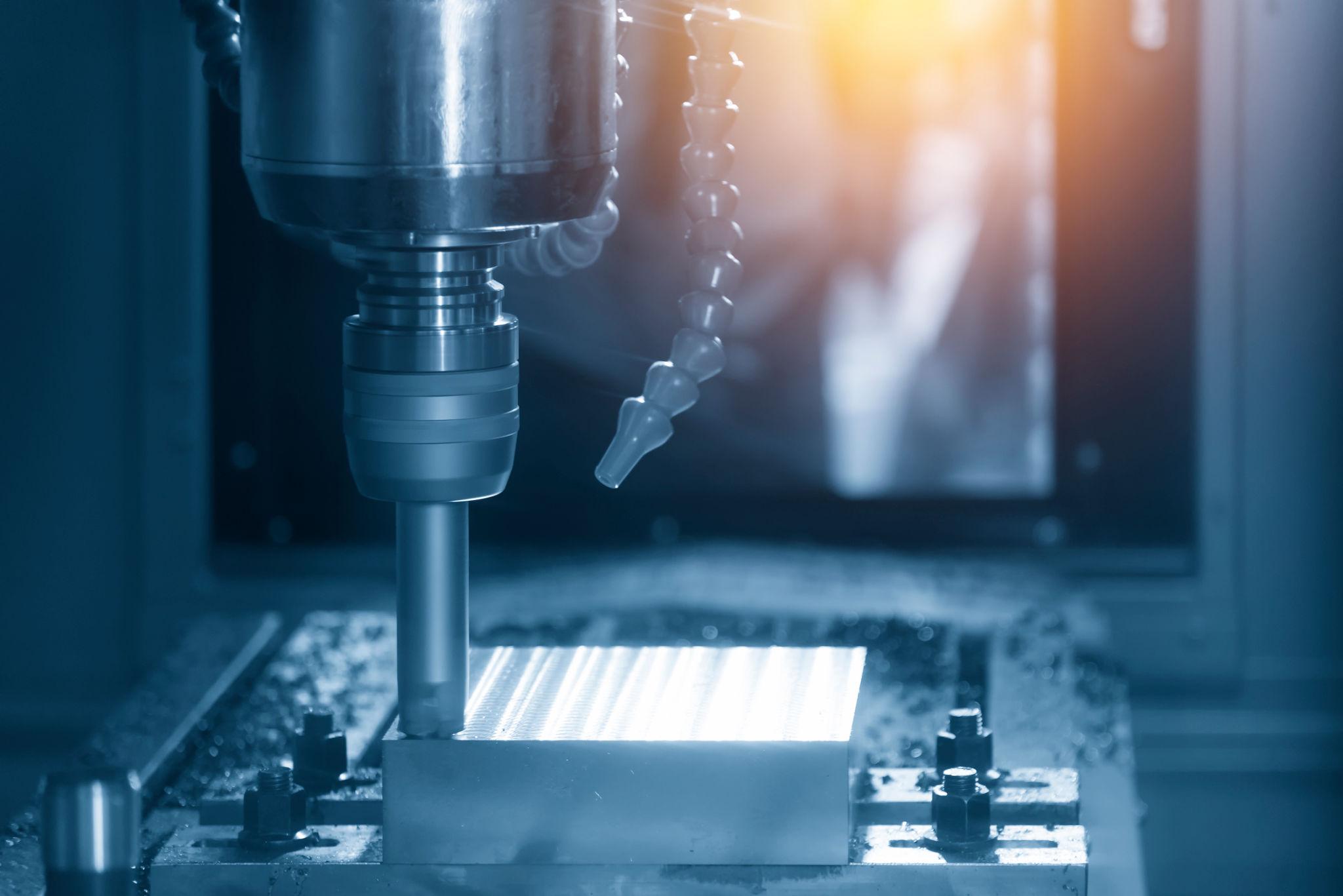 The CNC milling machine cutting the metal injection mold part with the square index-able tool.